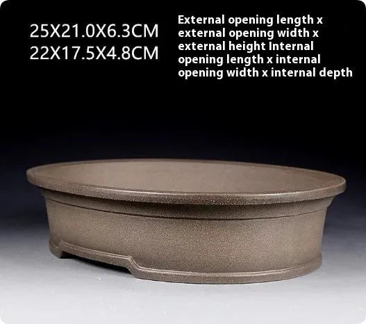 Handmade antique style oval purple sand ceramic bonsai pot, 25cm long by 21cm wide.