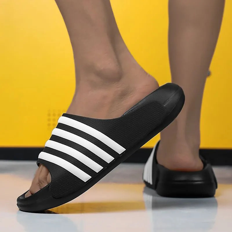 A pair of casual sport-style slippers with an EVA sole and PVC upper, shown in one of the available colour options.