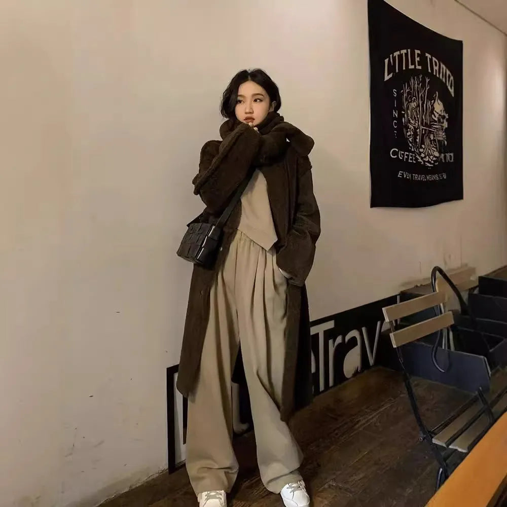 Women's khaki casual sport suit with loose fit long sleeve top and full-length trousers