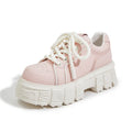 Women's beige muffin bottom leather casual shoes with wedge heel on white background