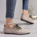 Beige leopard print pointed toe pumps for women with a block heel, shown in a plus size.