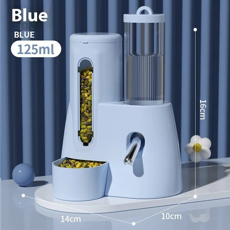 A white, blue, or pink plastic automatic water feeder and food basin for hamsters, available in large or small size.