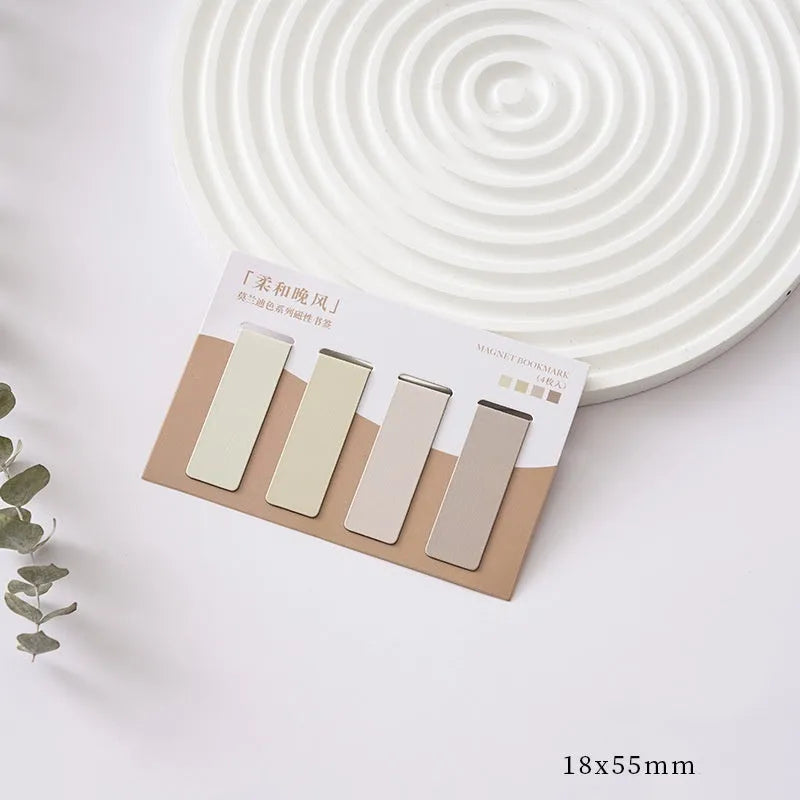 Set of four Morandi Series pastel colour-block magnetic bookmarks on a book page.