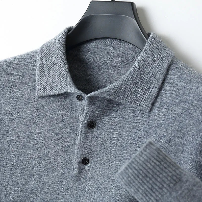 Men's woolen polo collar pullover sweater in noble blue colour on a hanger.