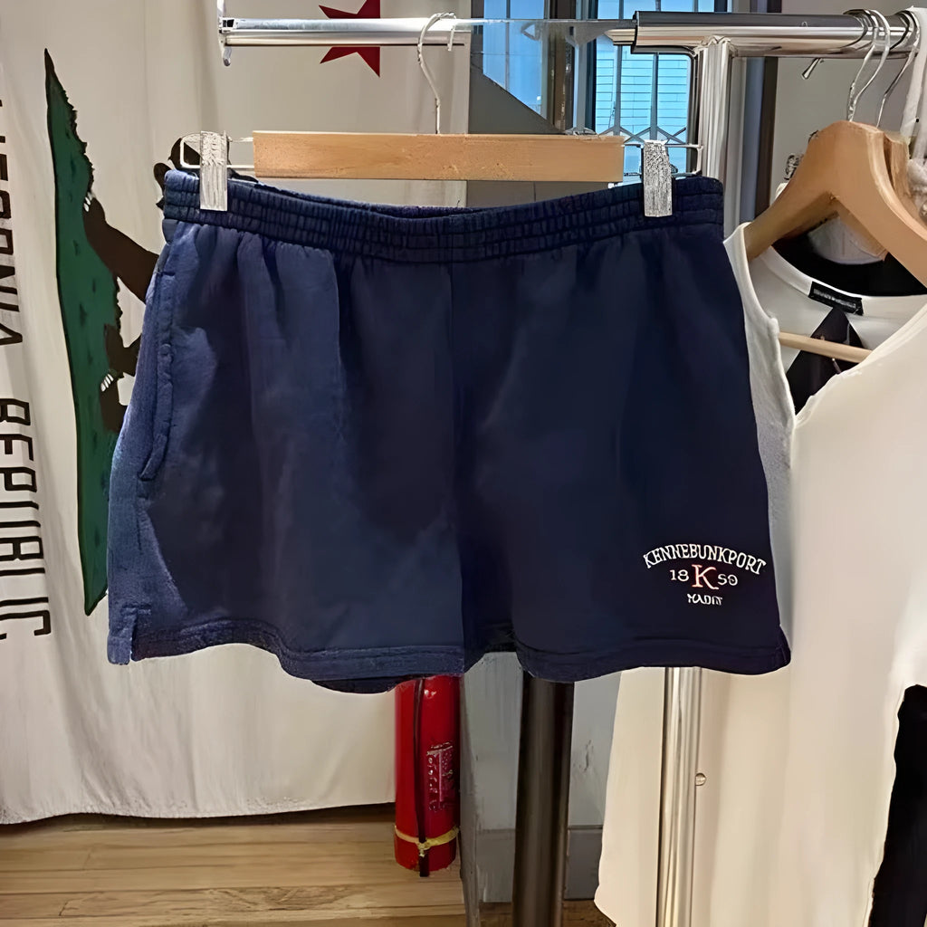 Women's dark blue cotton hot pants shorts with white flag embroidery detail