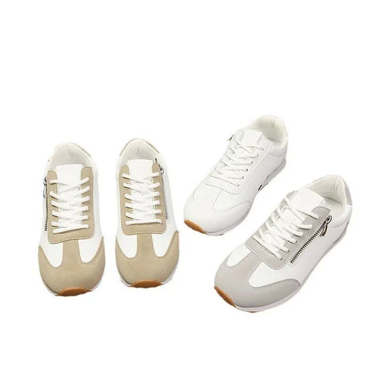Women's flat-heeled shoes in artificial PU, available in Champagne, Gray, and White colours with a rubber sole.