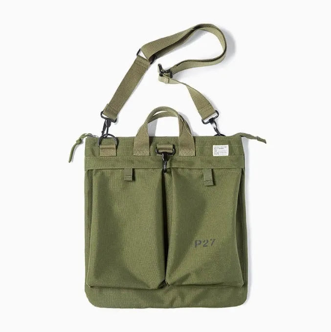 Marden Tooling military green canvas messenger bag with crossbody strap on a table