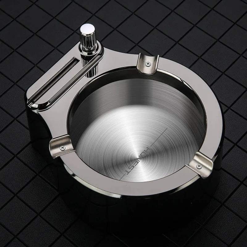 Large stainless steel ashtray with permanent match lighter in blue colour showing cigarette slots