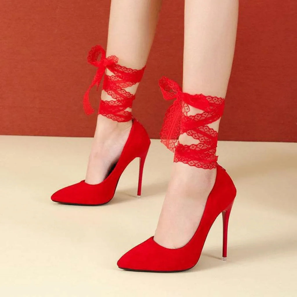 Women's black pointed toe high heel pump with a thin shallow mouth and a lace ankle strap