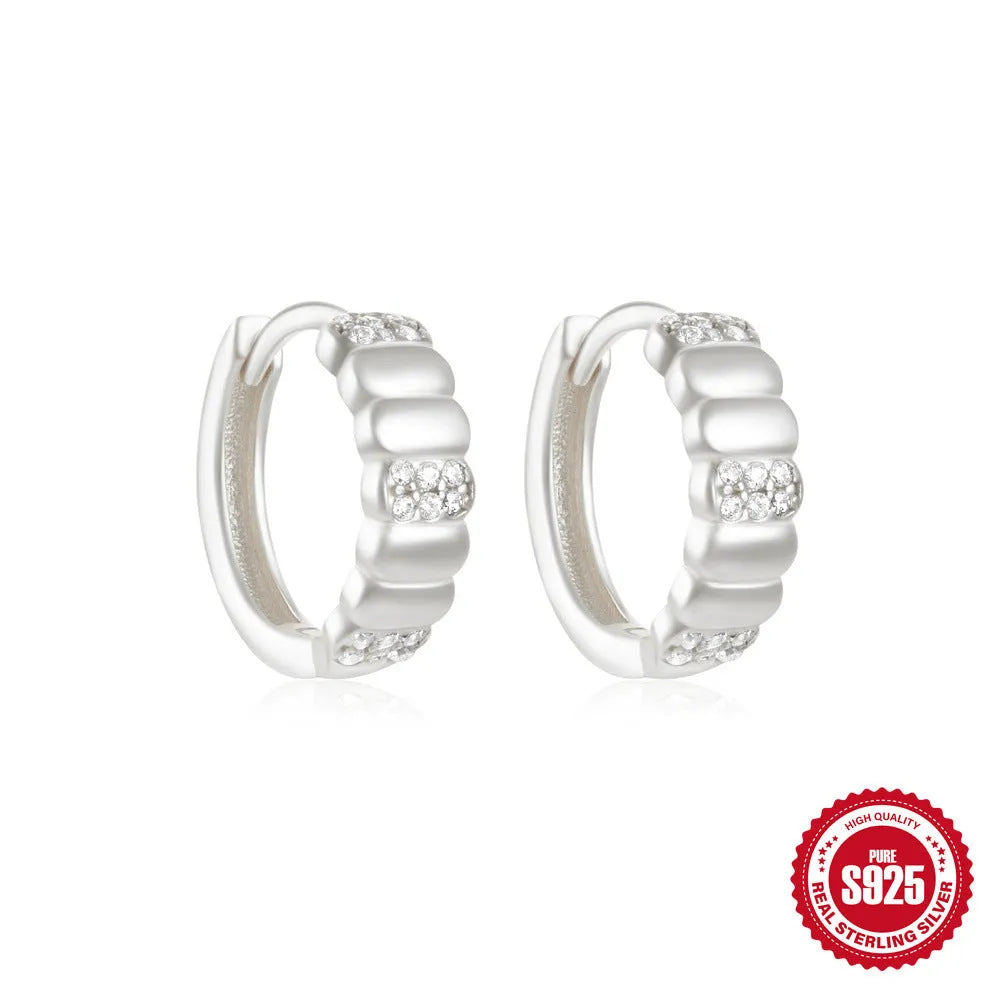 Sterling silver geometric stud earrings with small round diamond accents in gold or silver electroplated finish