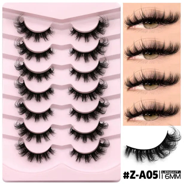 False eyelashes without eyeliner in thick natural long artificial fibre style with adhesive