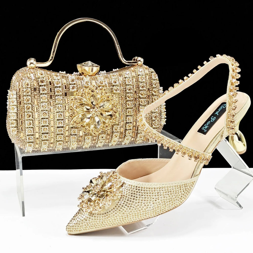 Women's black high heel shoes with matching clutch bag, decorative drill buckle flower ankle chain, and rhinestone details.