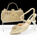 Women's black high heel shoes with matching clutch bag, decorative drill buckle flower ankle chain, and rhinestone details.