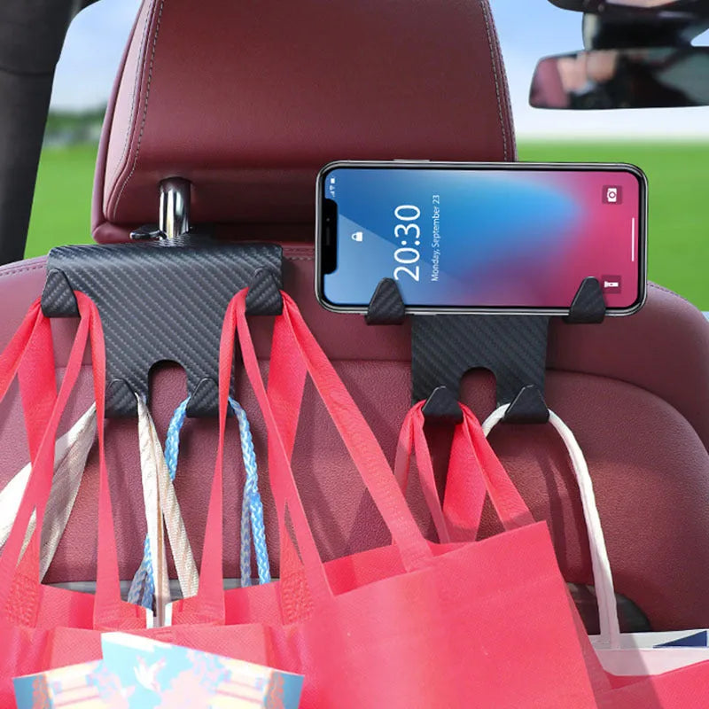 Black ABS plastic car hook and mobile phone holder for rear seat back storage.