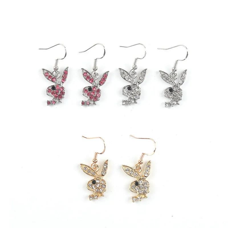 Alloy full diamond rabbit character stud earrings in silver, gold, or pink colour.