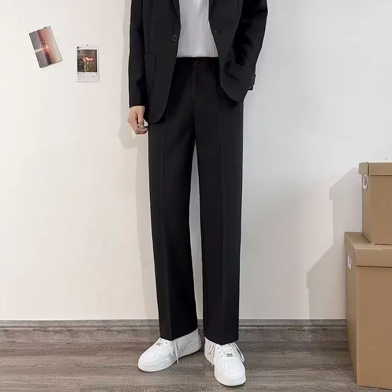 Men's plus size college style suit jacket and trouser set with white shirt and tie in loose fit design