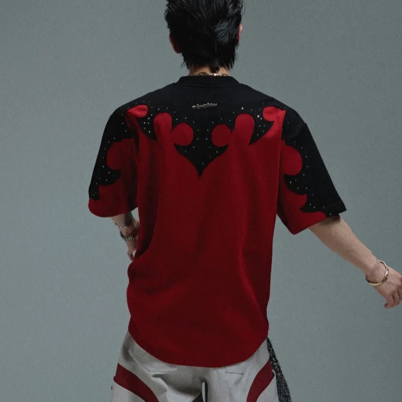 Men's grey short sleeve shirt with a raised burnt flower design and rhinestone detail on the chest.