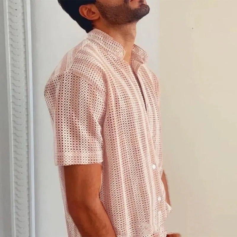 Pink men's loose cardigan shirt with waffle texture and short sleeves on a hanger
