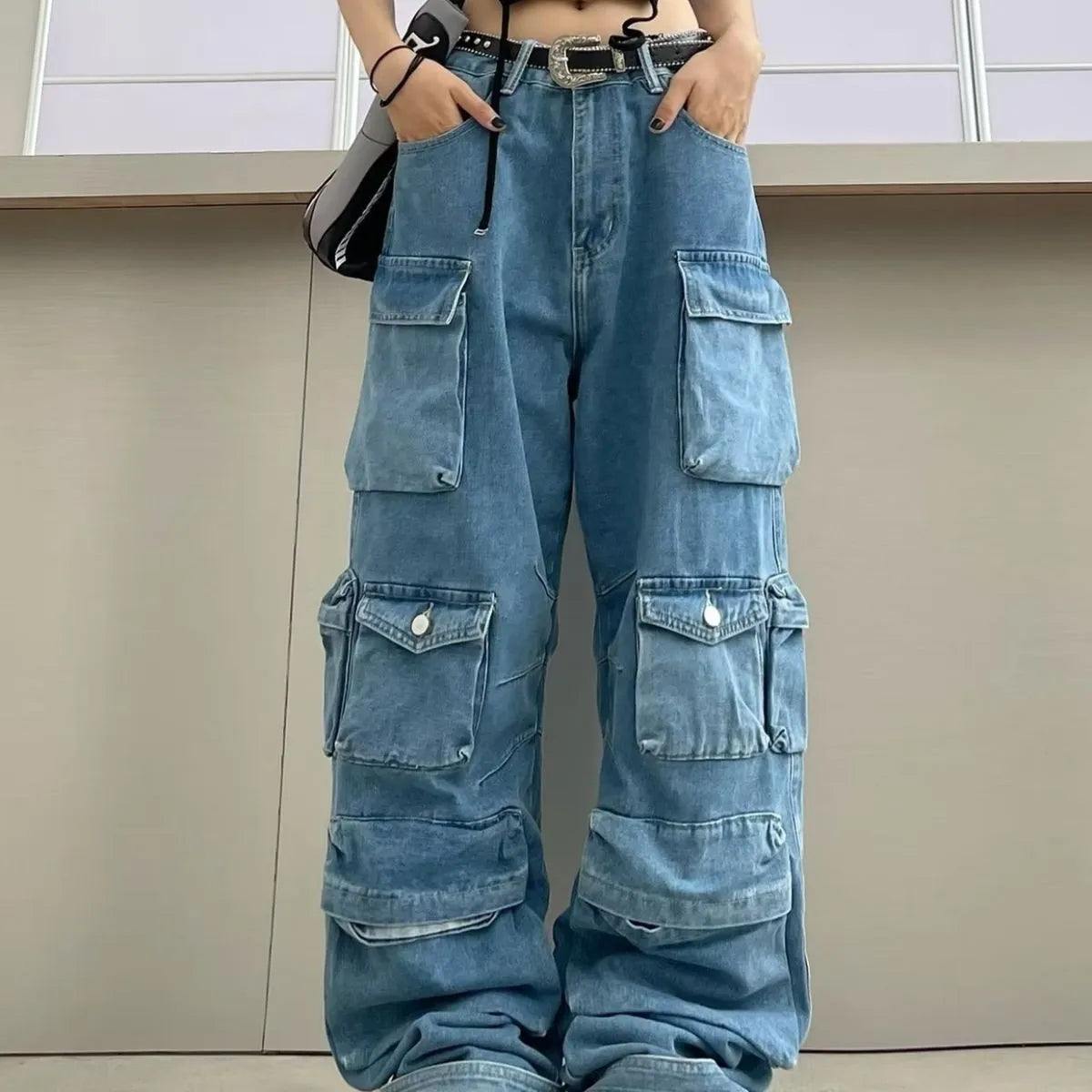 Women's high waist wide leg trousers with tie-dyed denim and multiple pockets in blue colour