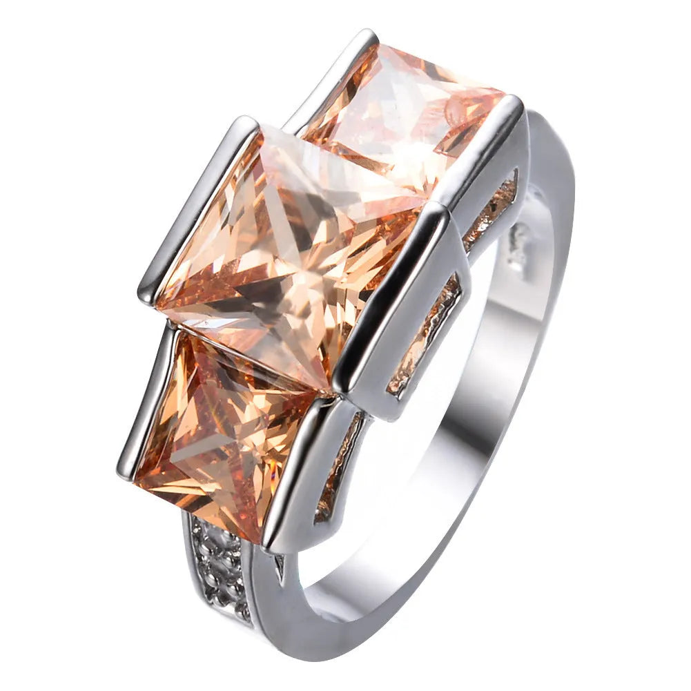 Geometric copper women's ring with an electroplated finish shown in multiple colour options on a white background.