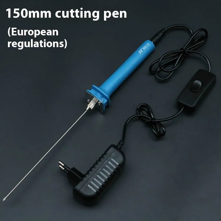 Blue plastic-handled electric foam cutter pen with adapter on a work surface.