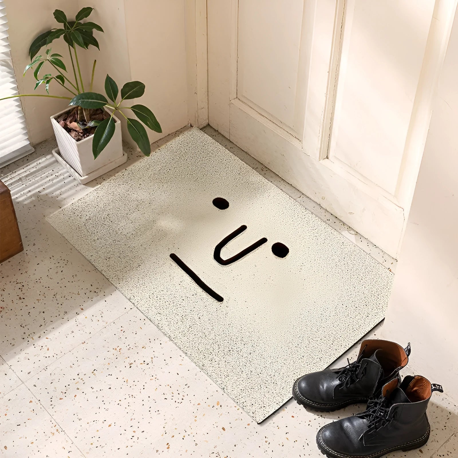Square PVC floor mat with Mr. Big Nose cartoon face and geometric pattern design in multiple size options.