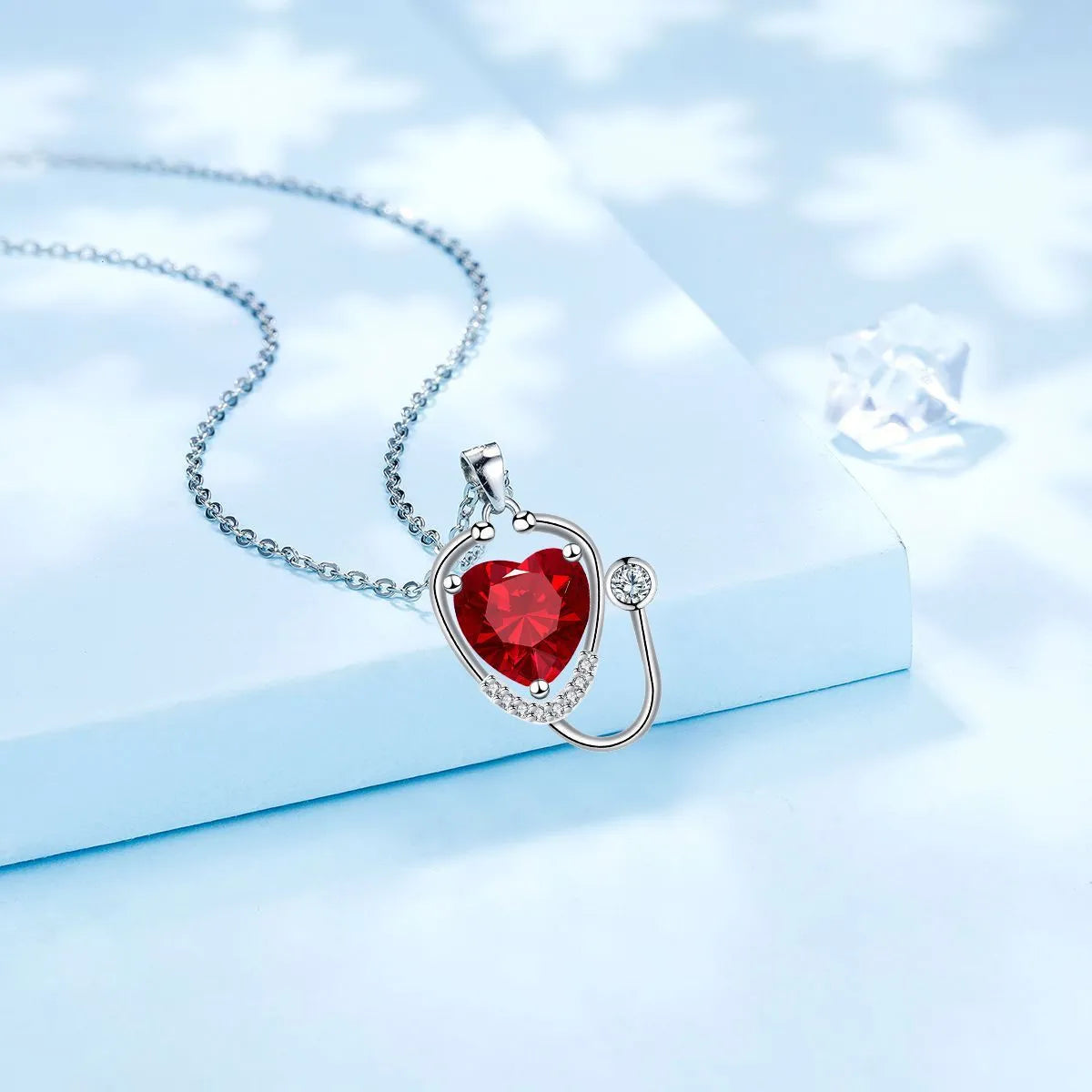 Women's stethoscope necklace with red diamond electroplated finish on copper chain