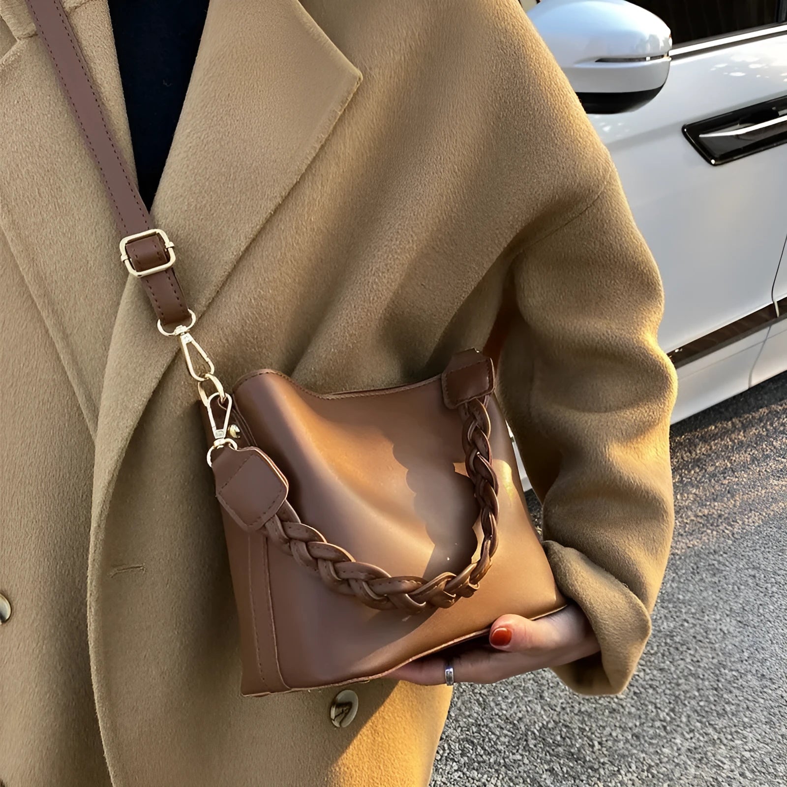Retro woven PU bucket bag in khaki colour shown as crossbody and underarm bag