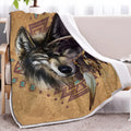 Brown sherpa fleece blanket with wolf head pattern, 150x200cm, on a couch
