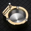 Large stainless steel ashtray with permanent match lighter in blue colour showing cigarette slots