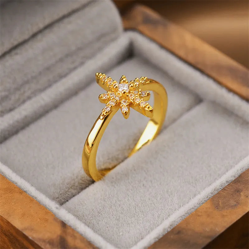 Geometric open women's ring in electroplated gold colour made from copper material