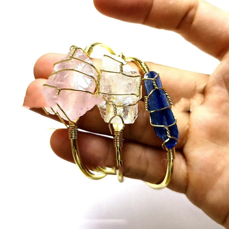 Unshaped natural crystal bracelet with gold winding wire geometric design