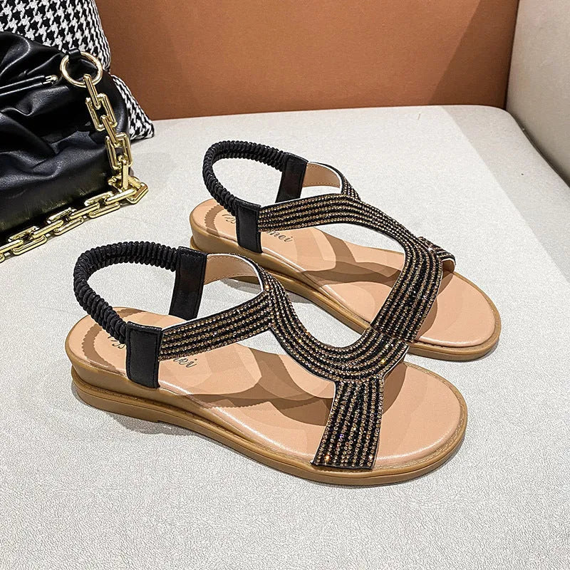 Gold women's PU patent leather beach sandals with rhinestones and a round toe.