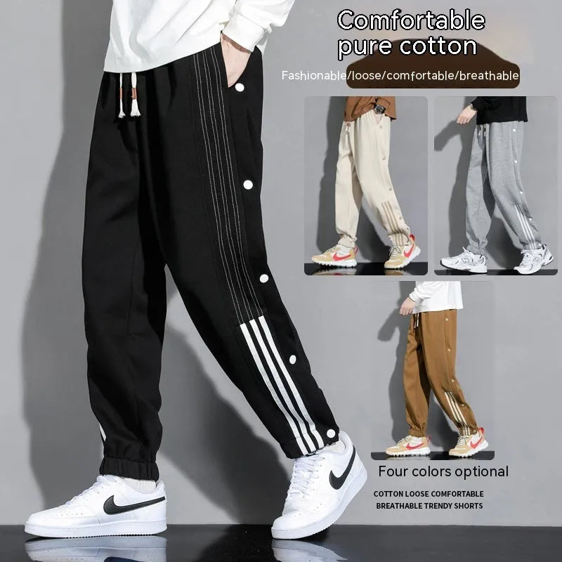 Men's loose fit cotton blend sports trousers with ankle tie fastenings and drawstring waist