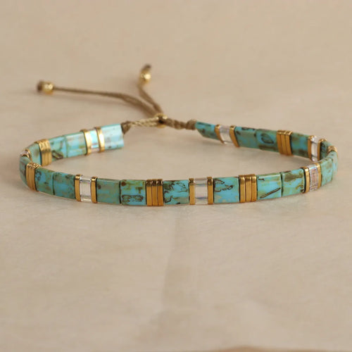 Glass and coloured glaze beaded bracelet with geometric round beads in five colour options