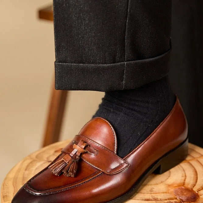 Men's black and brown business casual tassel loafers made from genuine leather with pigskin lining