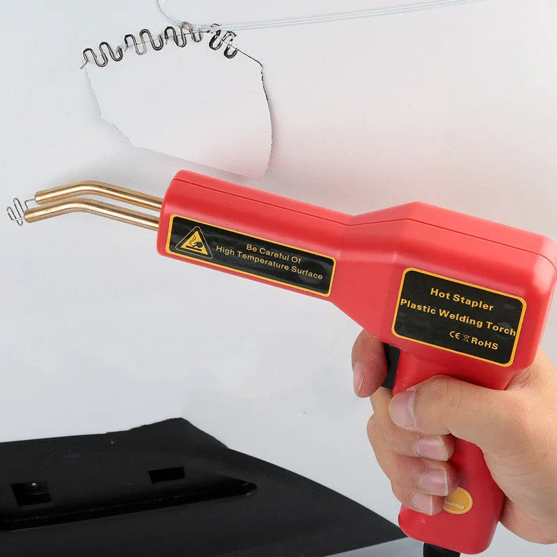 CR-307 black plastic welding gun with LED light, adjustable welding nails, and a long power cord for automotive repair.