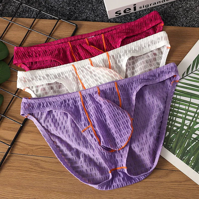 Men's white ice silk lace low waist briefs on a plain background