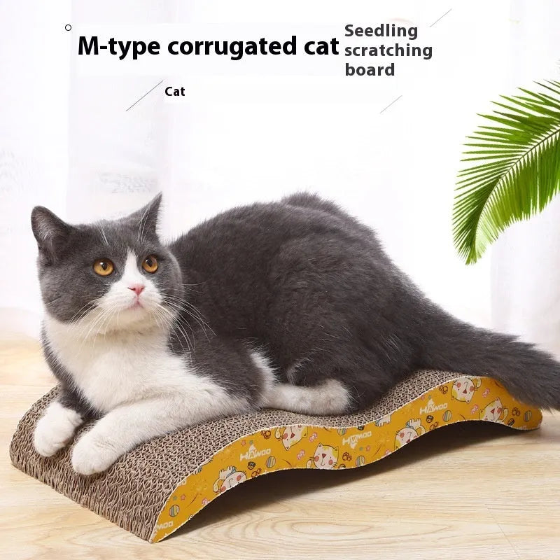 Wall-mounted cat scratch board in decorative shape made from corrugated paper with leather hanging tab