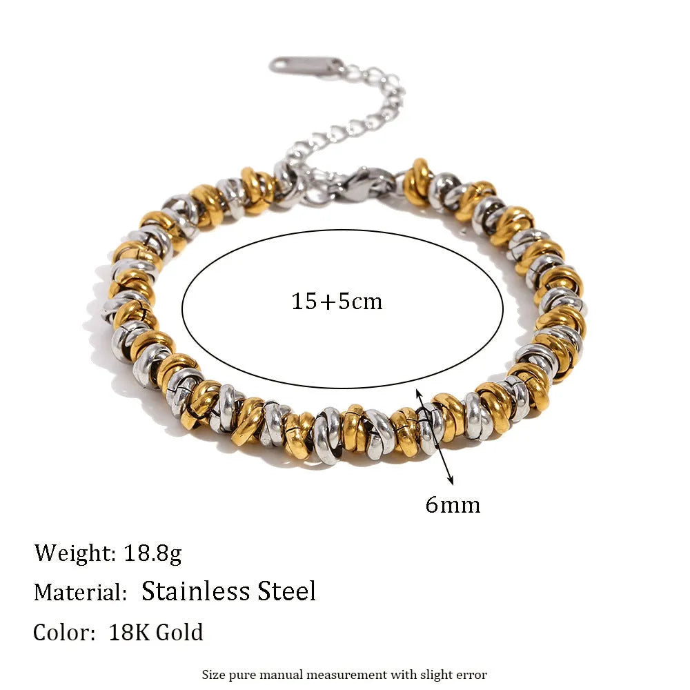 Geometric gold electroplated stainless steel jewellery set with earrings, bracelet and necklace