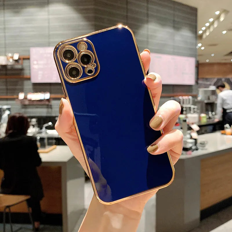 Gold plated electroplated iPhone case with silicone stripes on a tpu body in emerald green colour.