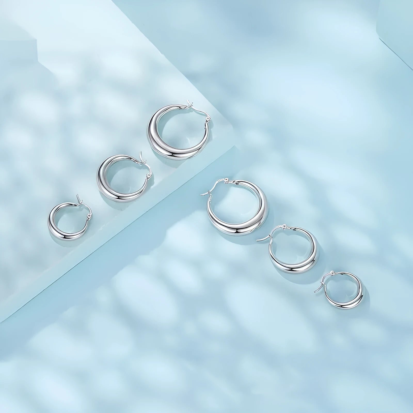 Women's copper ring clip earrings with electroplating treatment in three size options