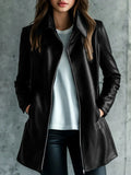 Women's solid black leather jacket with long sleeves, medium 65cm length, on a hanger.