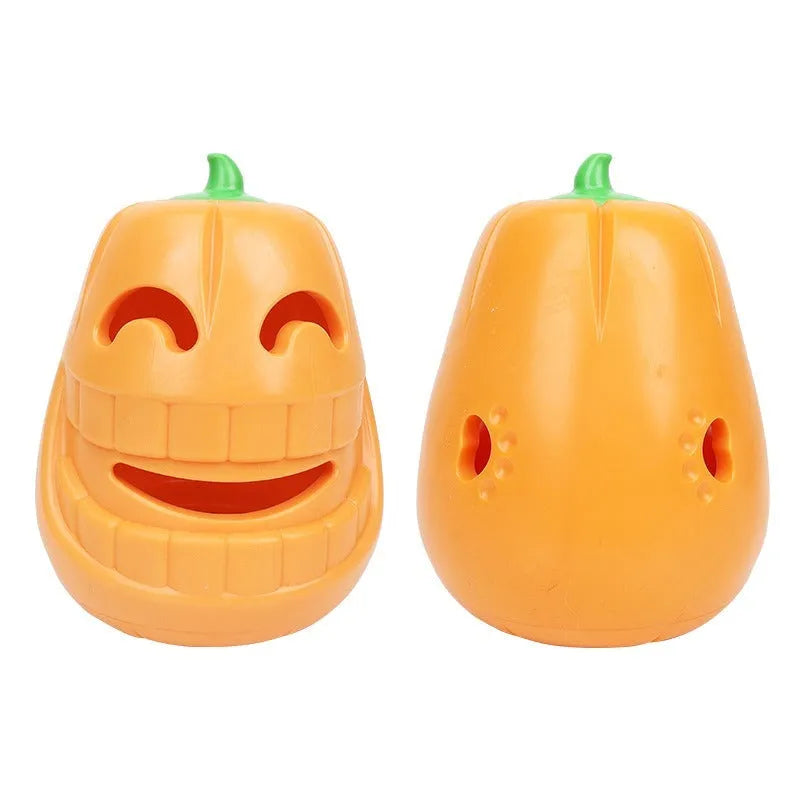 Halloween pumpkin shaped orange interactive dog chew toy with treat-dispensing funnel