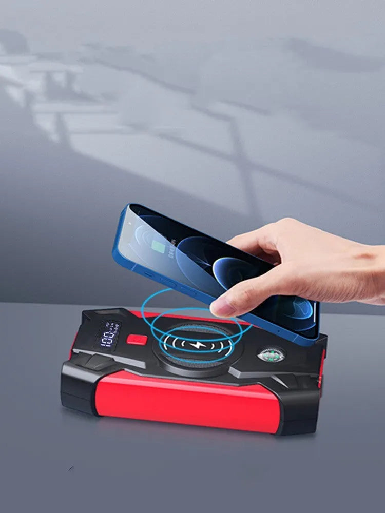 Red car jump starter with digital display and air pump accessory for 12V battery emergency starting