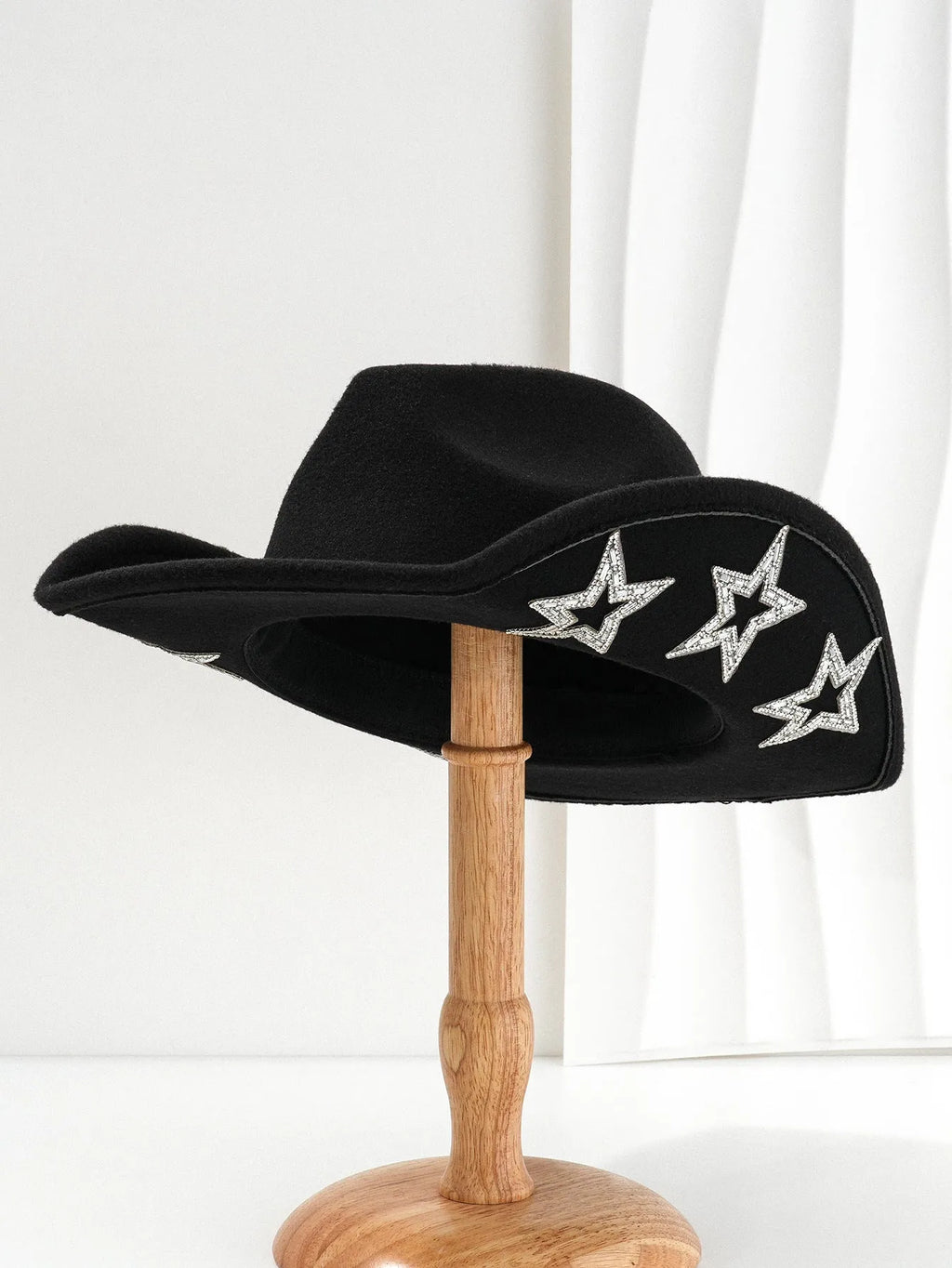 Beige polyester Western denim top hat with a conical crown and a hexagonal star decoration on the front.