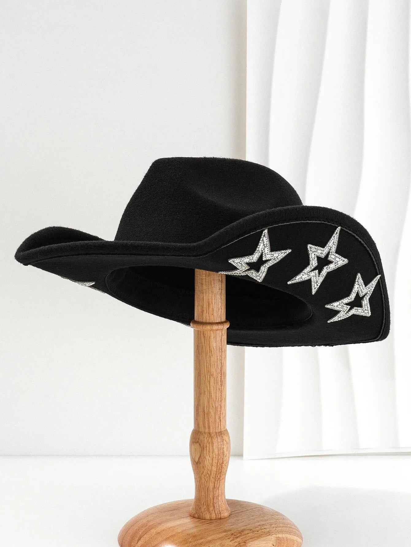 Beige polyester Western denim top hat with a conical crown and a hexagonal star decoration on the front.
