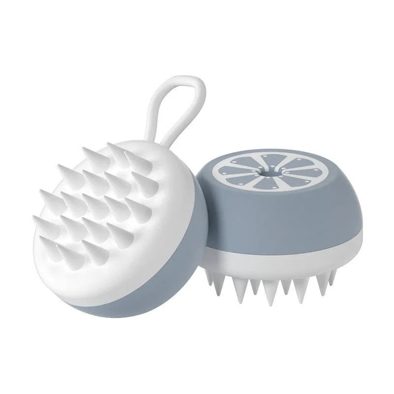 Yellow silicone pet bath brush with massage head for dog and cat grooming during bathing