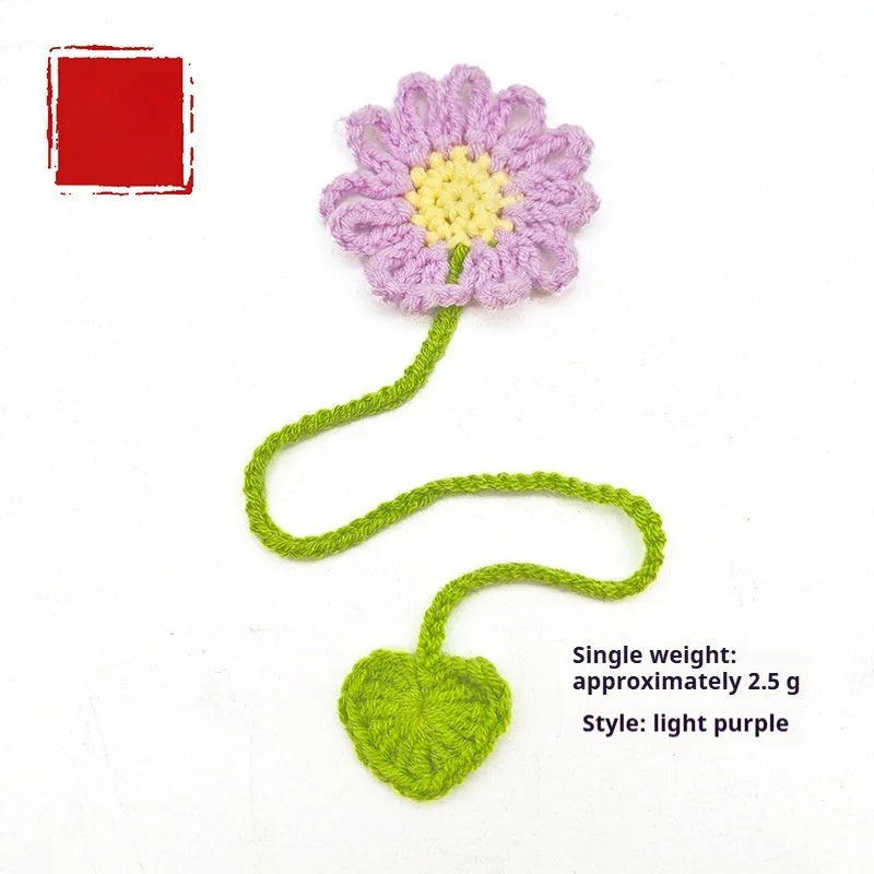 Hand-crocheted wool bookmark with daisy motifs on flexible wire in multiple colour options