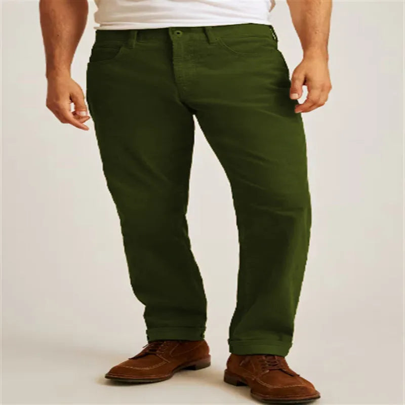 Straight-leg corduroy trousers in a solid colour on a mid-waist model.